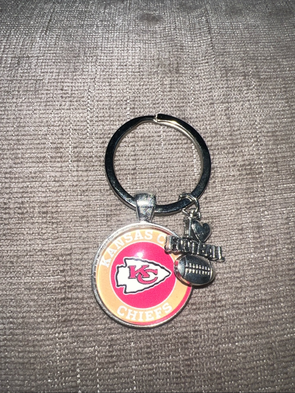 Kansas City Chiefs Round Logo Keychain with Football Charm - Red & Yellow